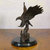 Statues d'oiseaux en bronze