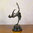 Statue en bronze art déco d'une danseuse " La révérence "