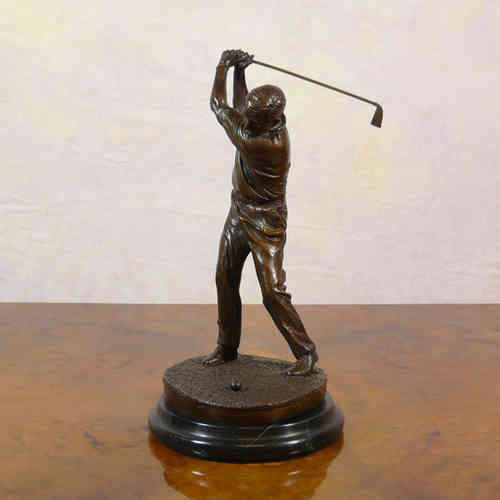 Bronze statue of a golfer