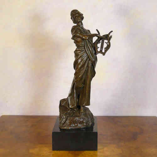 Lyre de la musa - estatua de bronce