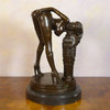 Erotic bronze sculpture of a naked woman
