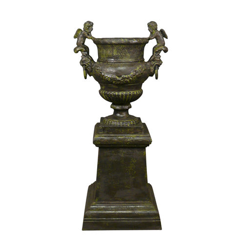 Cast iron urn with cherubs on his base