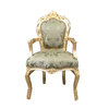 Baroque armchair with a green fabric